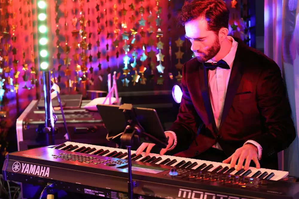 Teamuitje Katwijk: samen gitaar spelen tijdens muzikale workshops